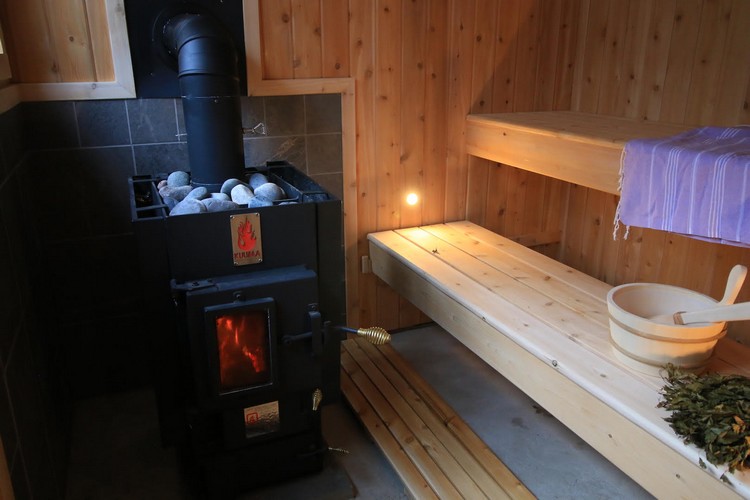 Sauna Stoves Kuuma picture of sauna stove installed and working in sauna